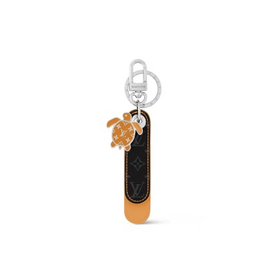 LOUIS VUITTON DRAGONNE TAB KEY HOLDER AND BAG CHARM M02551